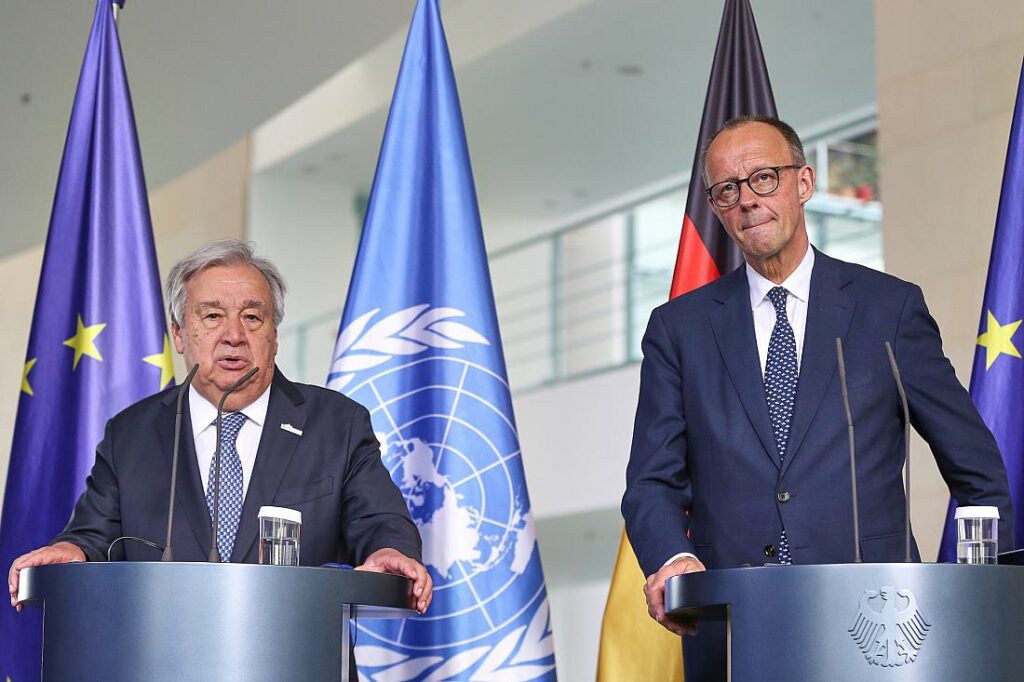 Merz sagt bei Guterres-Besuch auch künftig UN-Beitragszahlungen zu